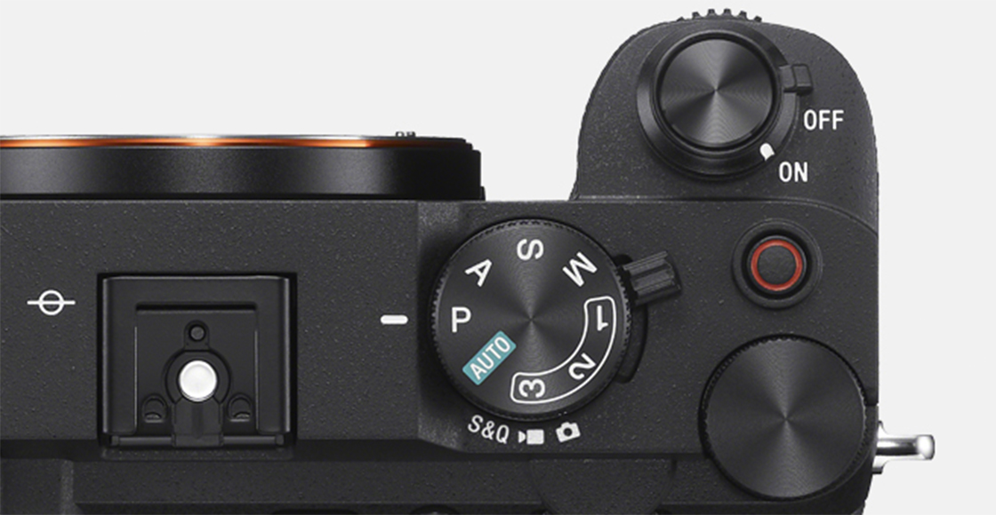 Product image showing close-up view of dials on top of camera